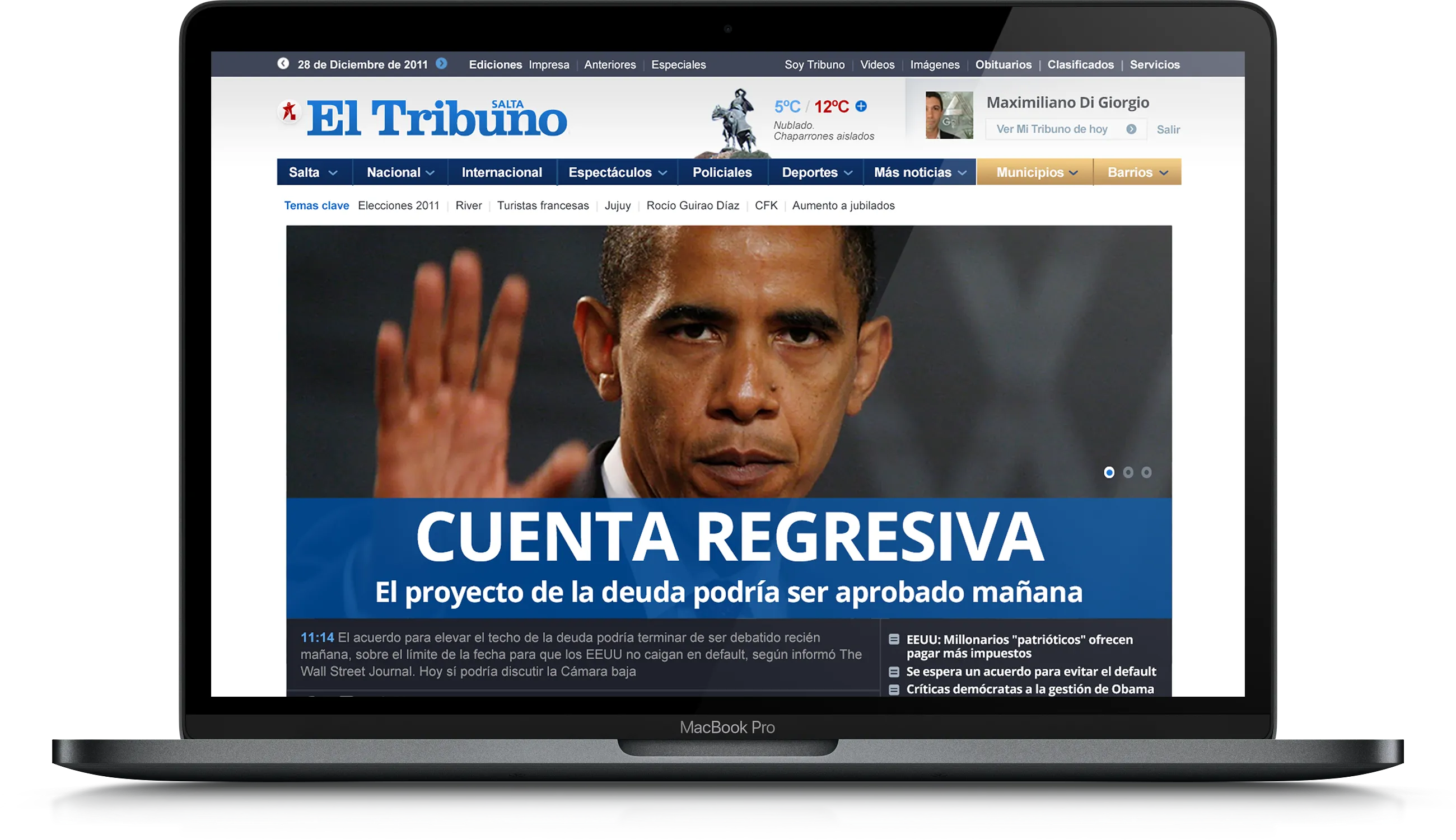 Laptop displaying the El Tribuno newspaper.